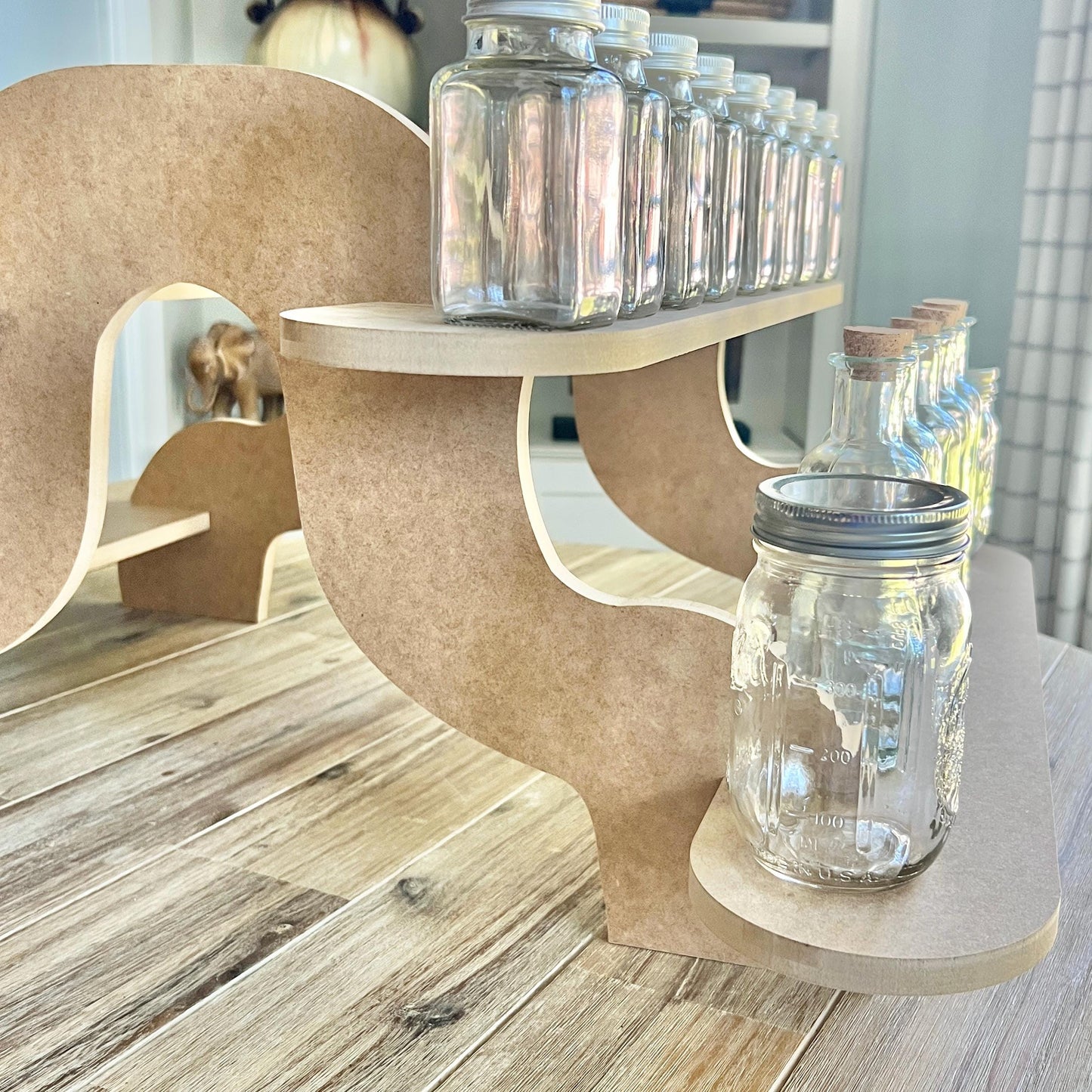 2-Tier HDF Display Stand: Dual Sided Curvy Shelving and Supports